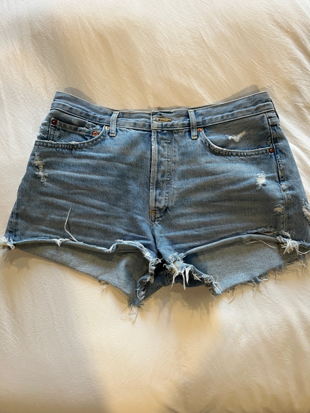 Agolde Light Blue Distressed Denim Cutoff Shorts